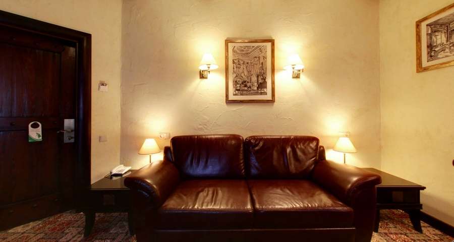 Suite №104, leather sofa