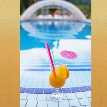 Summer cocktail by the pool at a hotel in the Carpathians, 2018